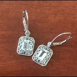 Silver lever back earrings with light blue stones